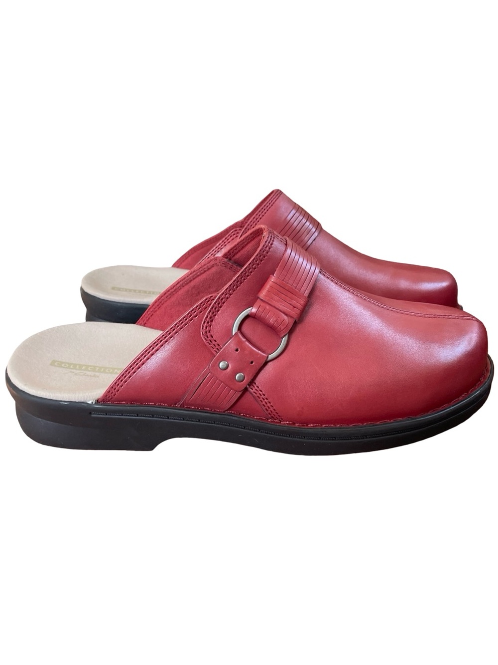 Clarks Patty Lorene Red Leather slip-on clogs with a buckle detail